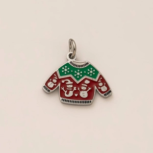 Detail of Christmas sweater pendant with colorful enamel snowflake and snowman patterns