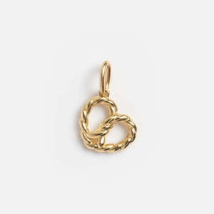 Close-up of twisted 14K gold-plated heart-shaped pendant with intricate rope texture