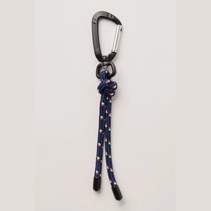 Detail showing a durable D-ring carabiner and blue nylon braided rope with vibrant texture
