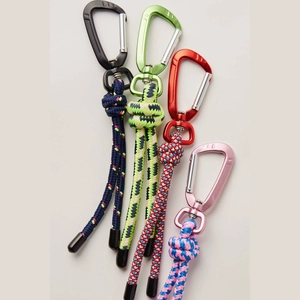Detailed view of colorful woven paracord keychains with aluminum D-ring carabiners