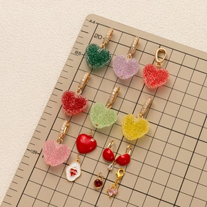 Chic gold-plated heart pendants featuring colorful zircon and enamel in diverse styles