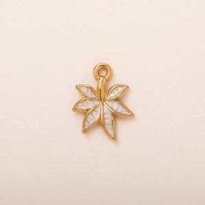 Detail of 18K gold-plated leaf pendant with white enamel and bead texture edges
