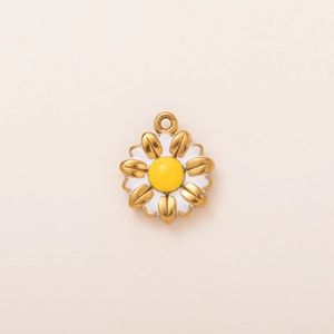 Detail of 18K gold plated daisy pendant with white enamel petals and yellow flower core