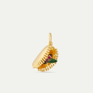 Macro detail of a 18K gold-plated Venus Flytrap pendant with red gems and green enamel