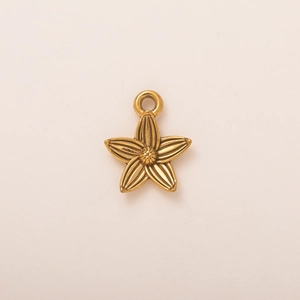Macro detail of 18K gold plated stainless steel five-petal flower shell charm