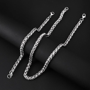 Set collana e bracciale a catena a spiga d'argento lucido con chiusura a moschettone