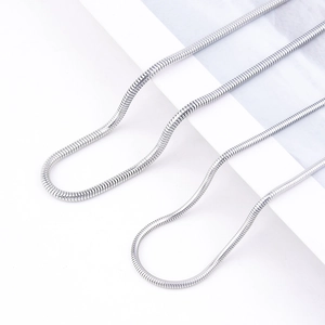 Minimalist silver stainless steel snake bone chain necklace with smooth flexible texture