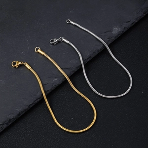Polished stainless steel round snake chain bracelet in gold and silver finish with lobster clasp