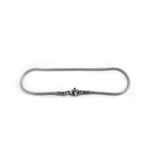 Detailed close-up of a silver stainless steel snake chain bracelet with lobster clasp