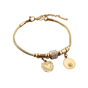 18K gold plated clover bracelet with sparkling heart charm and sun engraved coin pendant