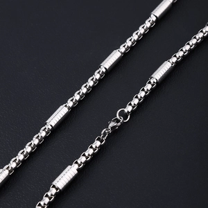 Polished stainless steel box chain necklace with striped cylindrical beads and lobster clasp