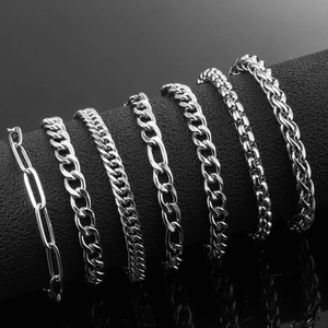 Collection of seven silver stainless steel Cuban and figaro chain bracelets for men and women