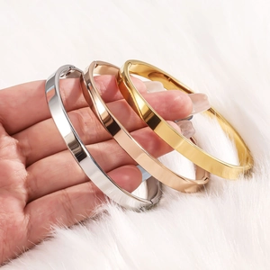 Polished 18K gold plated stainless steel 6mm bangles set in silver, gold and rose gold