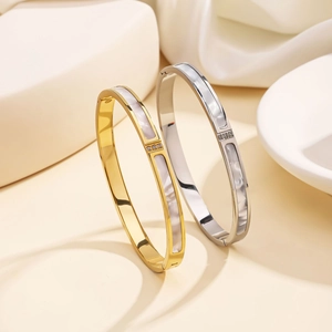 Minimalist 18K gold and silver stainless steel bangles with mother of pearl inlay