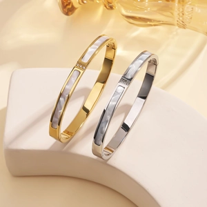 Minimalist stainless steel shell bracelets with crystals in gold and silver plating