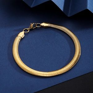 Detailed view of 18K gold plated stainless steel snake chain with lobster clasp closure