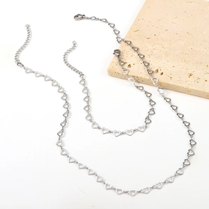 Detail of silver stainless steel hollow heart chain necklace with adjustable lobster clasp