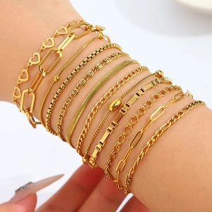 12-piece elegant 18K gold-plated stainless steel bracelet set layered on a female model