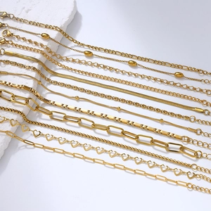 Collection of 18K gold plated stainless steel bracelets in various elegant chain styles