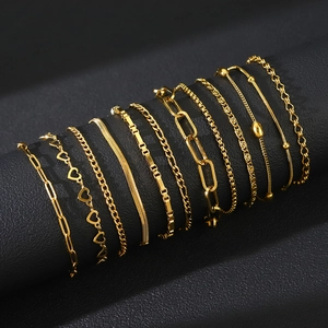 Detailed collection of 11 assorted 18K gold plated stainless steel chains on display