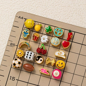 Colorful DIY charm set with football, rainbow, and smiley faces for jewelry making