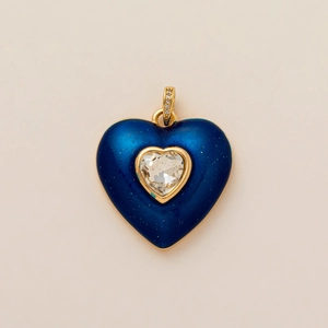 Blue enamel heart pendant with large clear gemstone and gold-plated bail with crystals