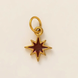 Golden octagonal star charm pendant with dark red enamel inlay and frosted finish