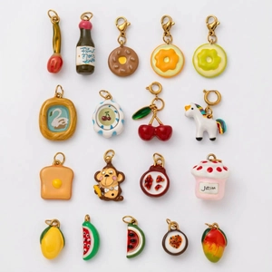 17-piece 18K gold plated enamel charm set with fruit, animals and food pendants