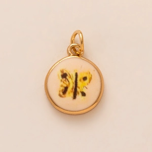 Gold-plated round charm featuring a butterfly motif and dual attachment loops