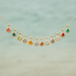 18K gold plated stainless steel necklace featuring thirteen colorful teardrop crystal pendants