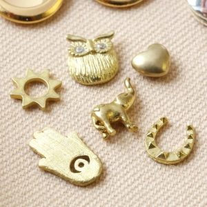 Gouden roestvrijstalen bedeltjes set met uil, olifant, hart en hamsa hand voor sieraden