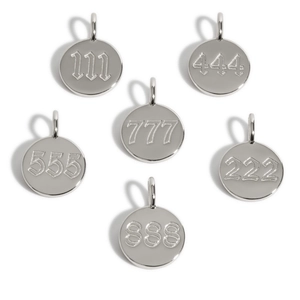 Detailed view of six silver stainless steel angel number charms with gothic engraving