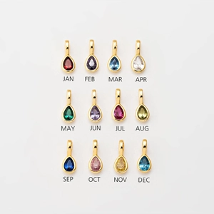 Twelve colorful birthstone pendants in gold stainless steel setting for women