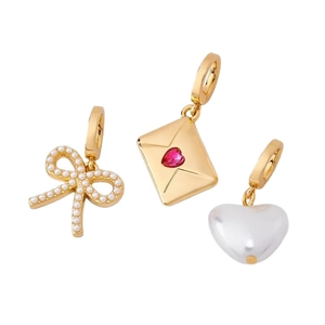Three-piece 18K gold plated jewelry set with bow, heart envelope, and pearl charms