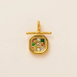 Detail of 18k gold plated octagonal pendant featuring colorful inlaid gemstones and T-bar bail