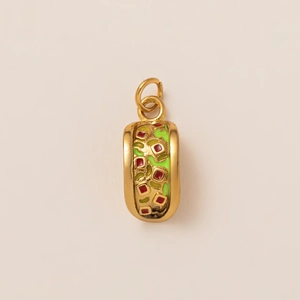 Detailed close-up of 18K gold plated taco charm with colorful enamel inlay for jewelry DIY