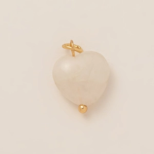 Translucent heart pendant made of creamy white stone with elegant gold accents
