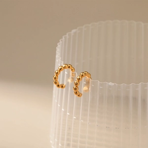 Detailed close-up of 18K gold plated bead ear cuff clip for non-pierced ears