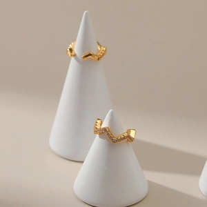 Gold-plated brass ear cuff with micro-pave cubic zirconia in a wavy C-shape design
