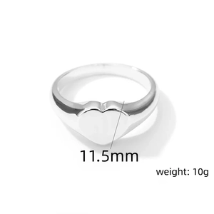Detailed view of silver heart signet ring showing 11.5mm height and 10g weight