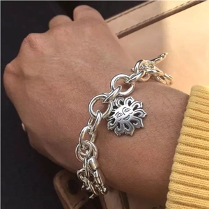 Silver punk style stainless steel chunky chain bracelet featuring a sun smiley face pendant