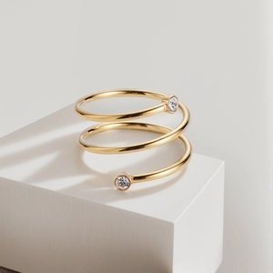 Anello a spirale minimalista in acciaio inossidabile placcato oro 18K con due zirconi