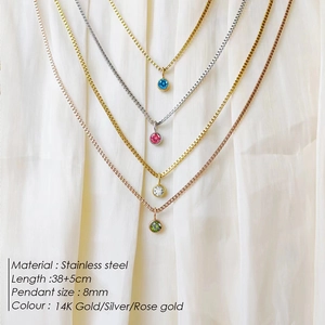 Minimalist stainless steel necklaces with 8mm birthstone pendants in gold and silver