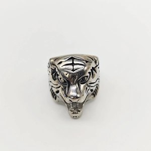 Detailed view of vintage silver tiger head ring with realistic 3D textured carving