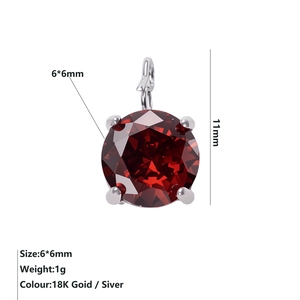 Macro detail of 6mm round ruby zircon pendant in 925 silver setting with dimensions