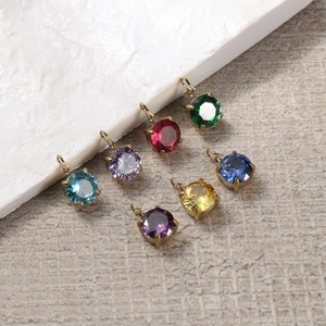 Golden geometric round pendants featuring colorful 6mm zircon birthstones for DIY jewelry