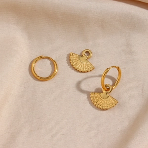 Bohemian gold stainless steel fan earrings with detachable round hoops on beige silk