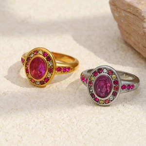 Vintage 18K gold plated ring featuring oval pink zircon and colorful gemstone halo