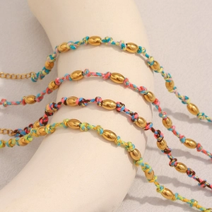 Bracelet Corde Tissée Acier Inoxydable Plaqué Or 18K Perles Tonneau Ajustable Bijoux Mode Bohème Femmes