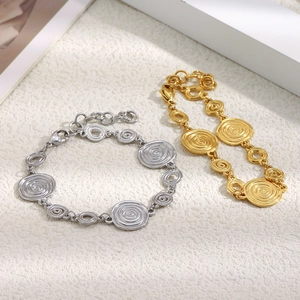 Bracelet en acier inoxydable doré 18K avec breloques spirales et fermoir mousqueton